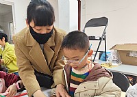 “情暖湛江”NO.1111遂溪青少年宫儿童服务站开展醒狮黏土手工制作主题活动