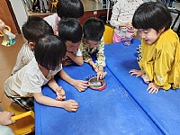 “情暖湛江”NO.510壹基金儿童服务站麻章镇文化站开展“谁轻谁重”趣味科学活动