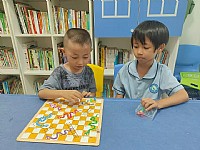 “情暖湛江”N516壹基金儿童服务站(湖光镇文化站)开展“趣味棋乐融融，快乐益智成长”主题活动