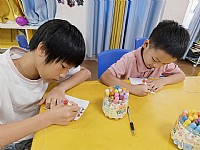 情暖湛江”NO.510壹基金儿童服务站麻章镇文化站开展“书香伴暑阅成长 傩舞非遗共读”主题活动